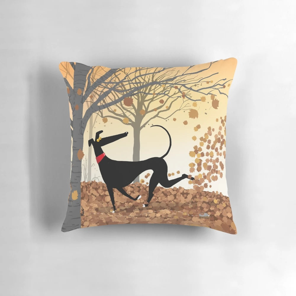 Charming illustration of a greyhound, whippet, or lurcher dog surrounded by autumn leaves on a decorative throw pillow