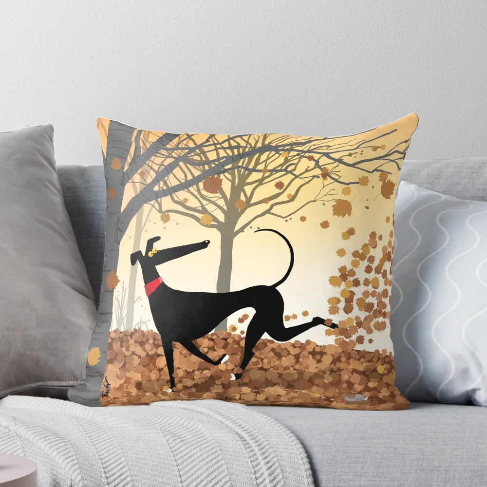 Charming illustration of a greyhound, whippet, or lurcher dog surrounded by autumn leaves on a decorative throw pillow