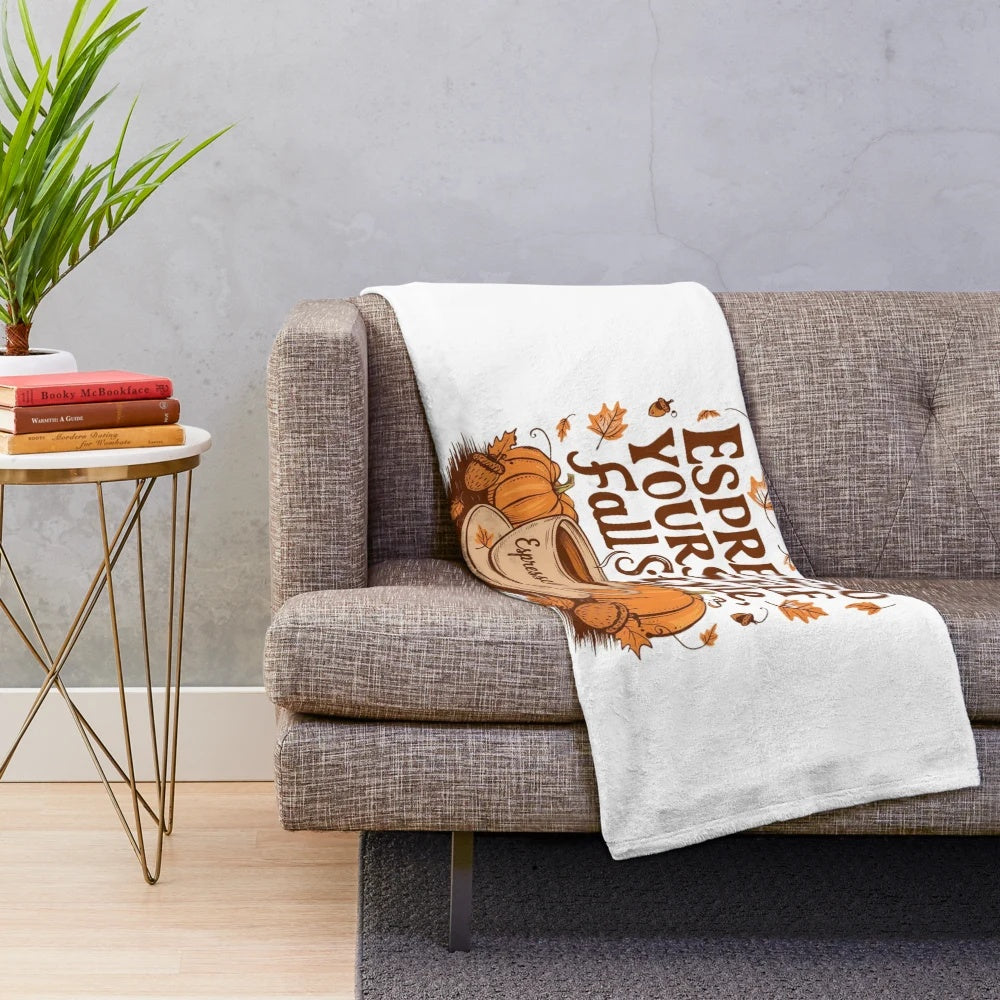 Plush blanket with autumn leaf and coffee cup design