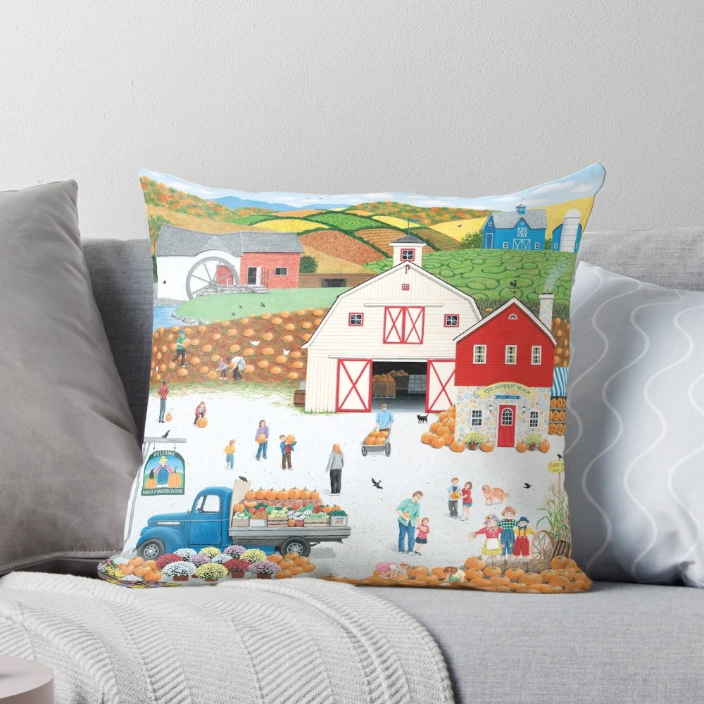Autumn-themed pillow with pumpkins, truck, and rural landscape
