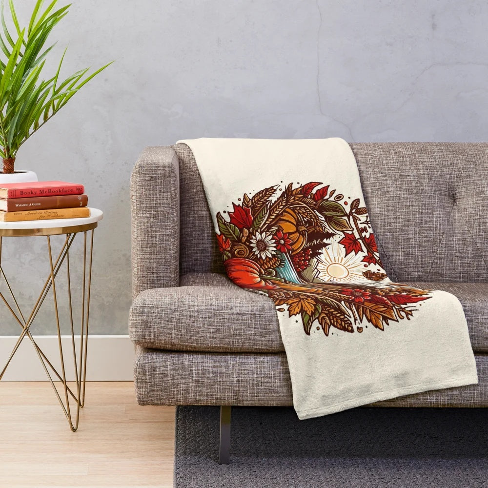 Colorful plush blanket with autumn leaves and pumpkin design