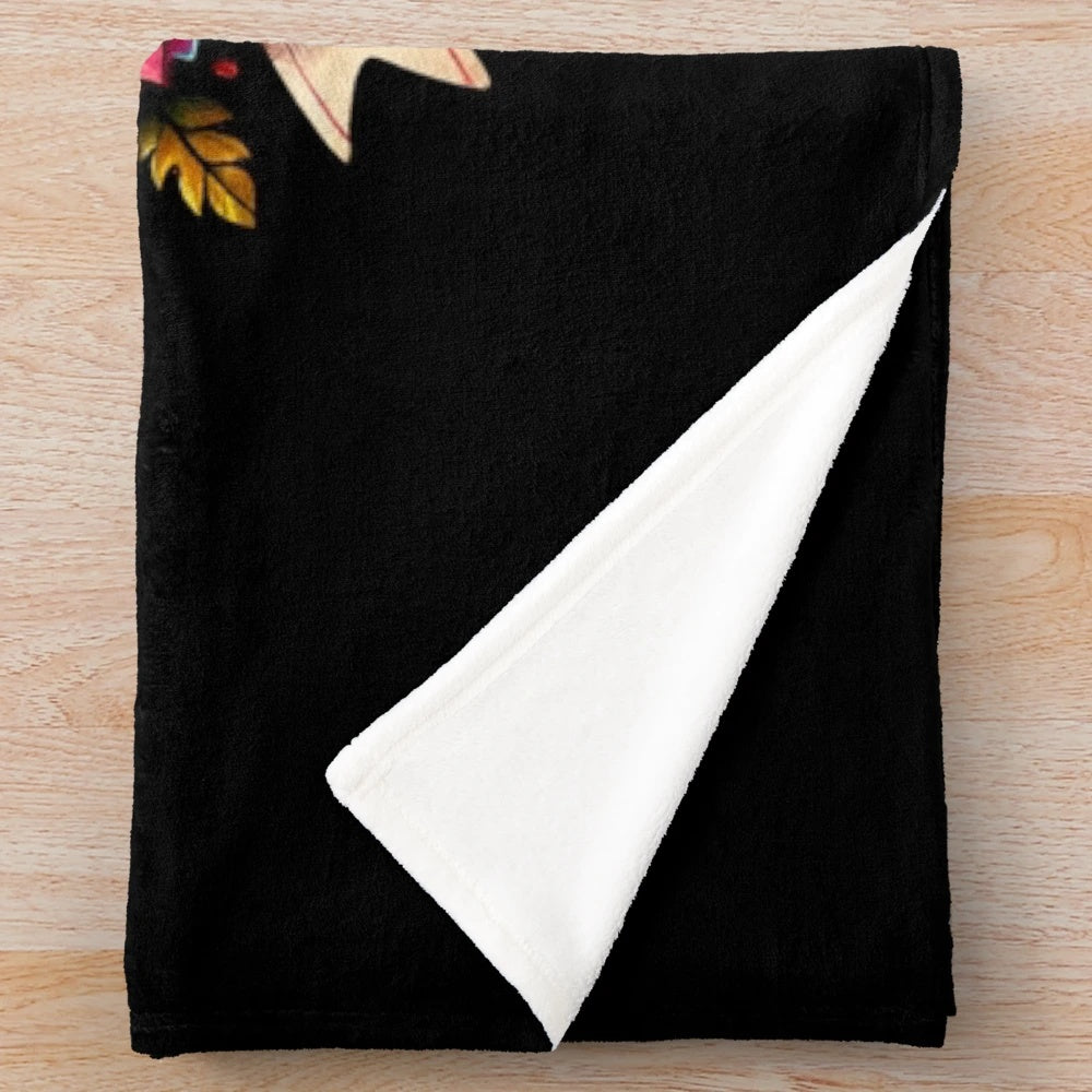 Plush blanket with a watercolor pumpkin design in autumn colors