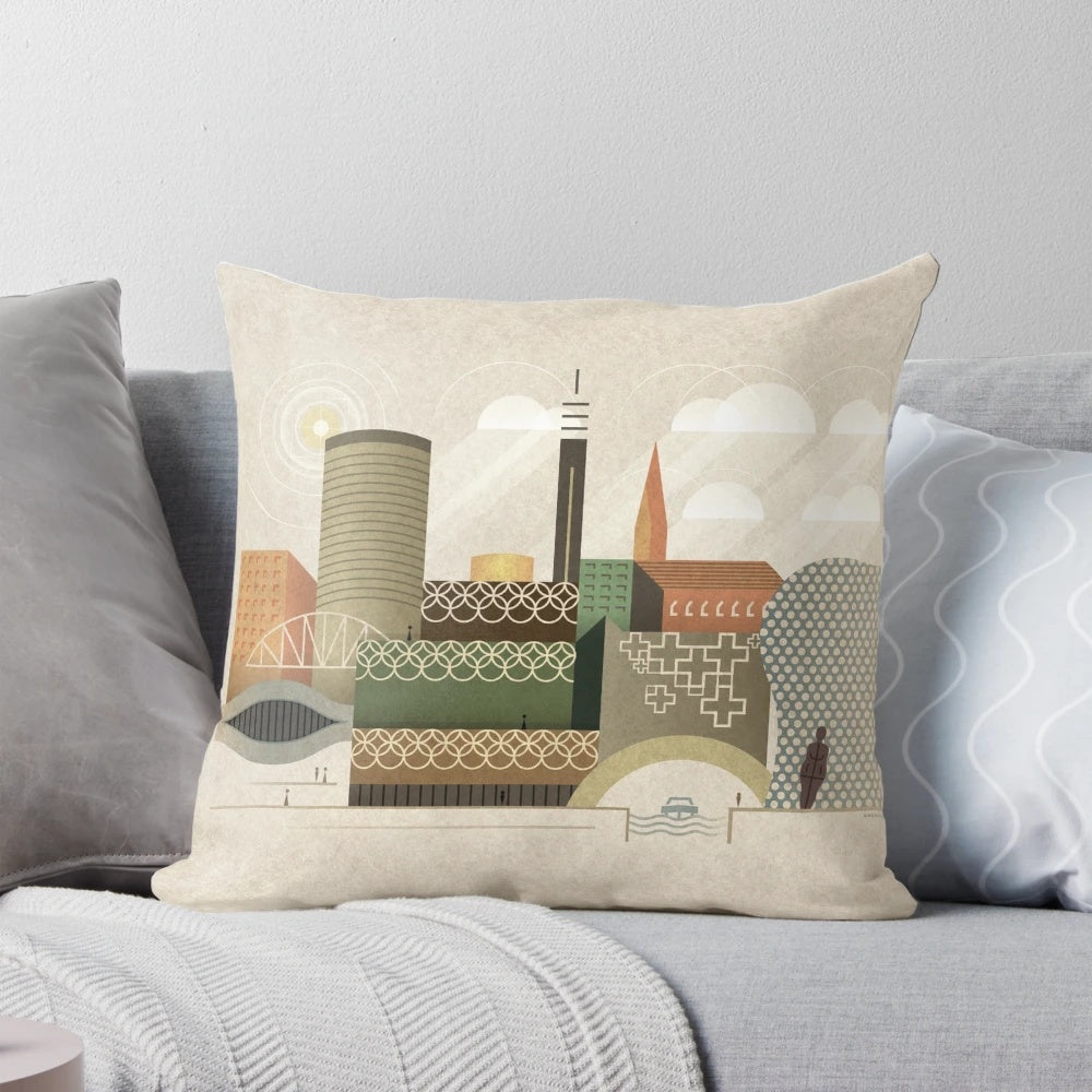 A decorative throw pillow featuring a cityscape of Birmingham, UK in autumn colors