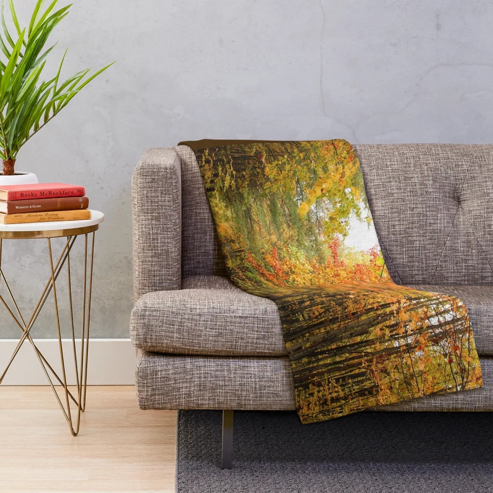Autumn-colored plush blanket depicting a trail through a wooded forest