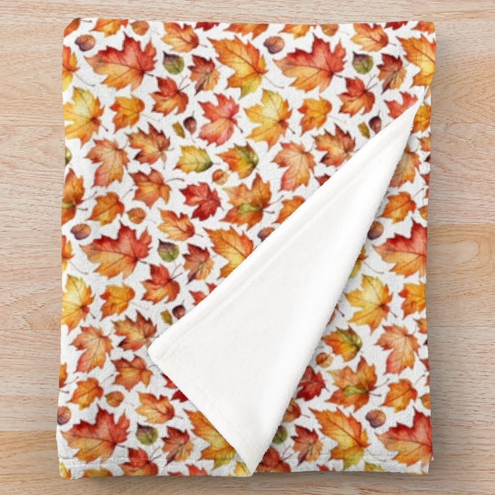 Plush autumn leaves blanket in warm, cozy colors