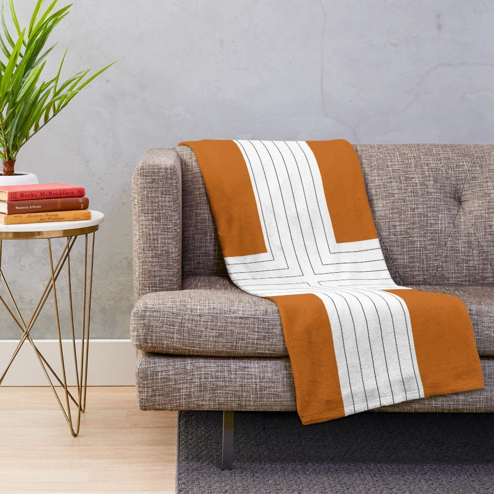 Maple brown plush blanket with an abstract, minimal autumn design