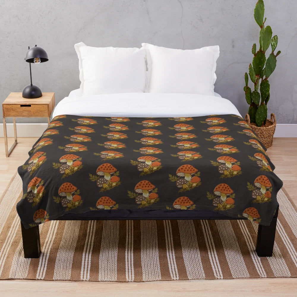 Soft and plush blanket with a retro autumn mushroom design