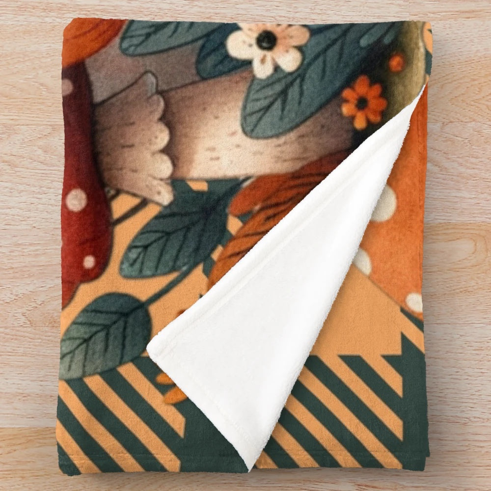 Cozy autumn mushroom plush blanket with whimsical fall design