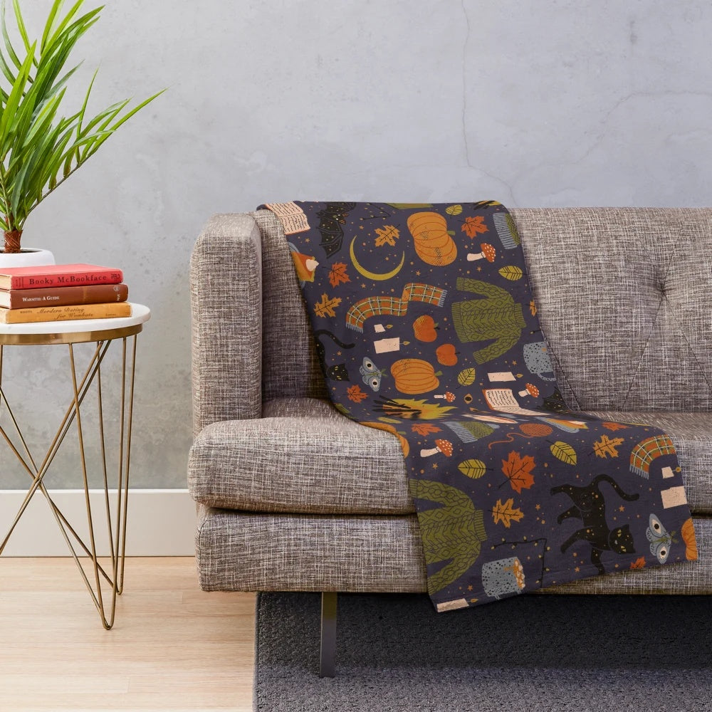Cozy plush blanket with autumn and spooky season design