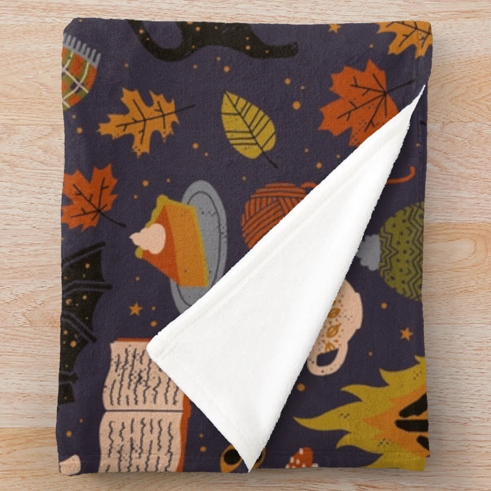 Cozy plush blanket with autumn and spooky season design
