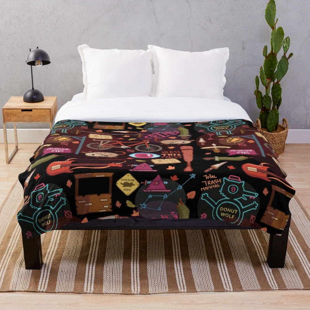 Cozy autumn pattern plush blanket featuring the Night in the Woods indie game design