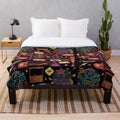 Cozy autumn pattern plush blanket featuring the Night in the Woods indie game design
