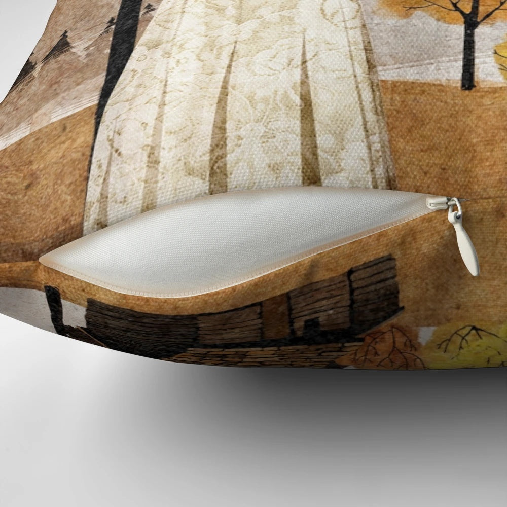 A cozy throw pillow featuring a beautiful autumn landscape with trees, mountains, and a cabin with a smoking chimney.