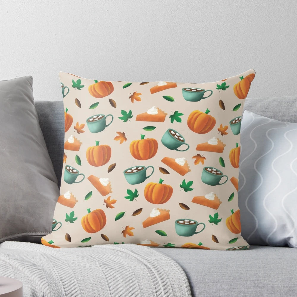 Cozy autumn-themed pillow with a nature-inspired pattern of falling leaves, pumpkins, and warm drinks.
