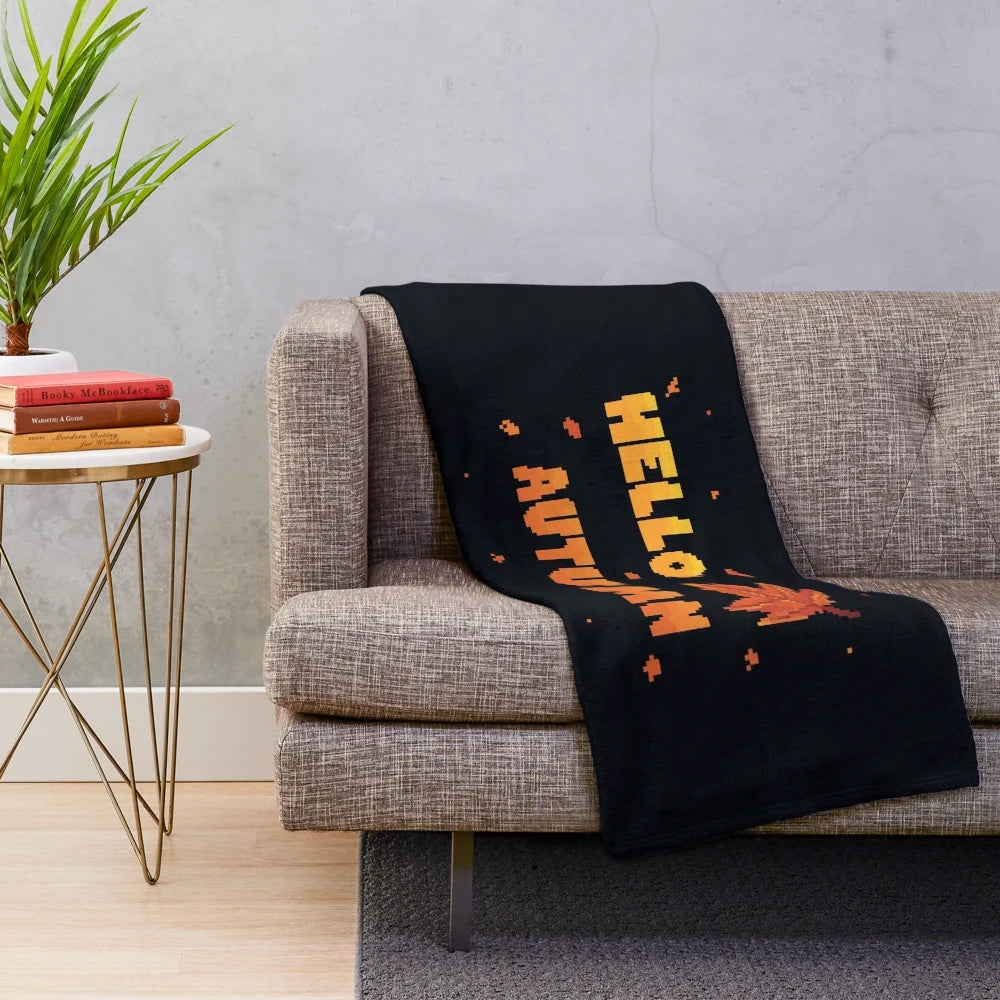 Pixel art plush blanket featuring fall leaves and maple leaf designs