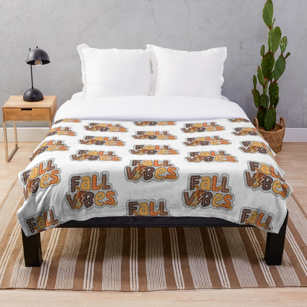 Soft and warm plush blanket with fall foliage design