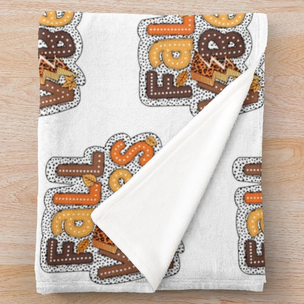 Soft and warm plush blanket with fall foliage design