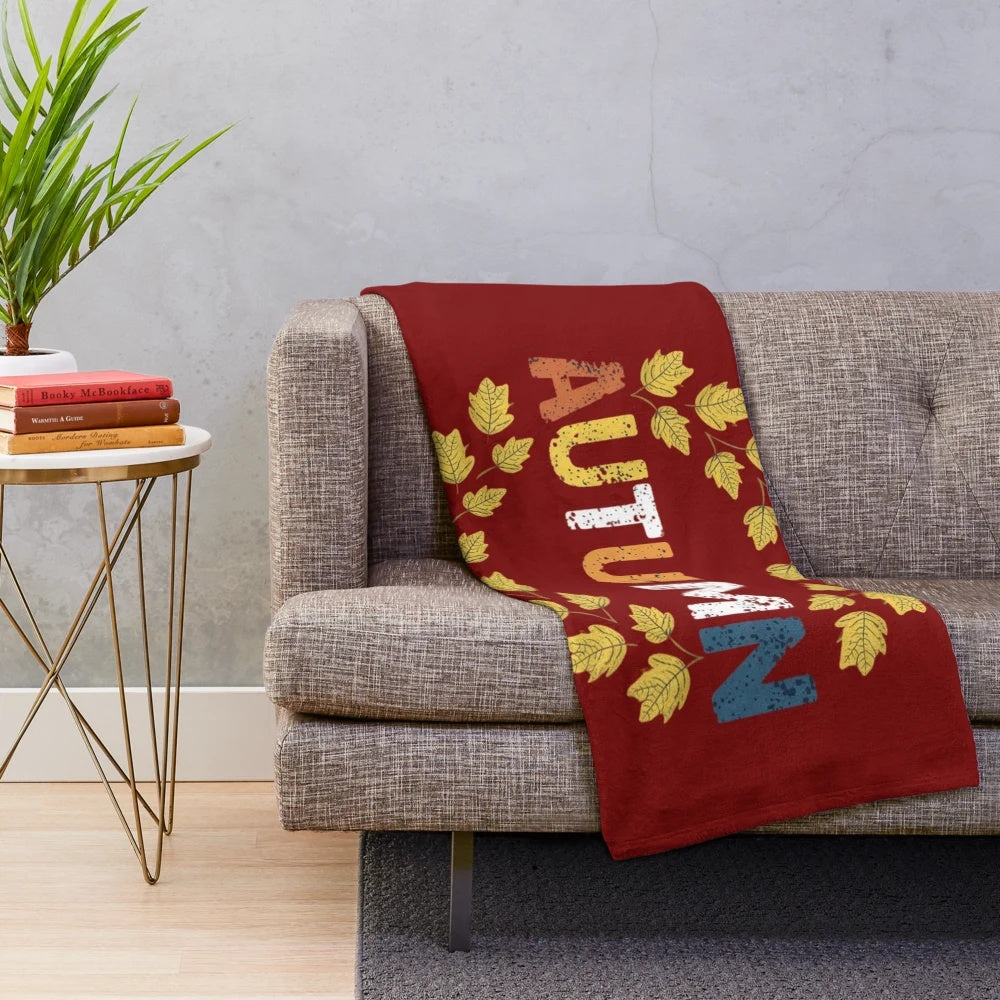 Autumn-themed plush blanket with warm, cozy texture