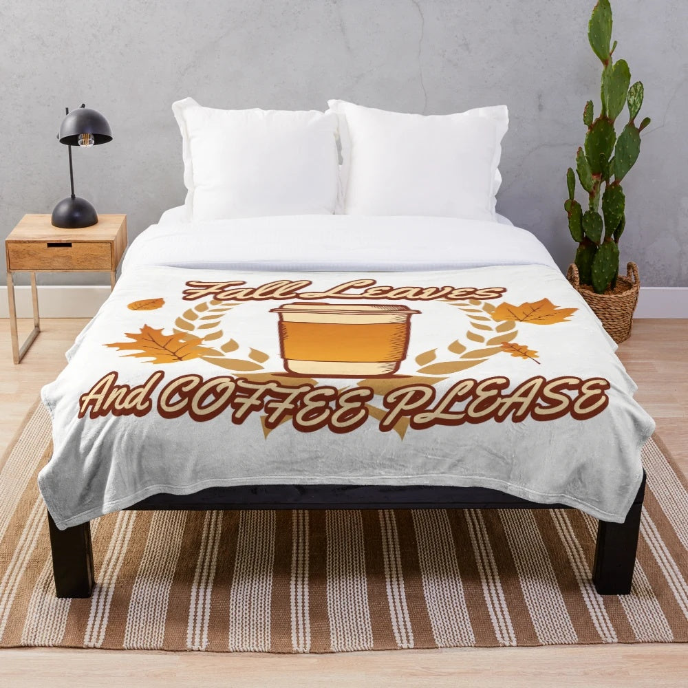 Plush blanket with fall leaves and coffee themed pattern