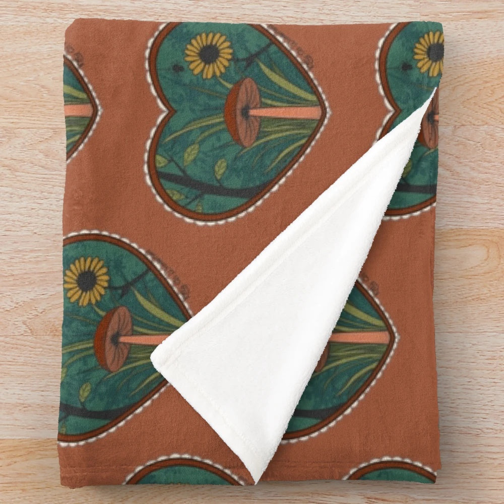 Plush autumn blanket with floral and botanical designs