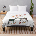 Plush blanket featuring a goat design and autumn leaves and acorns