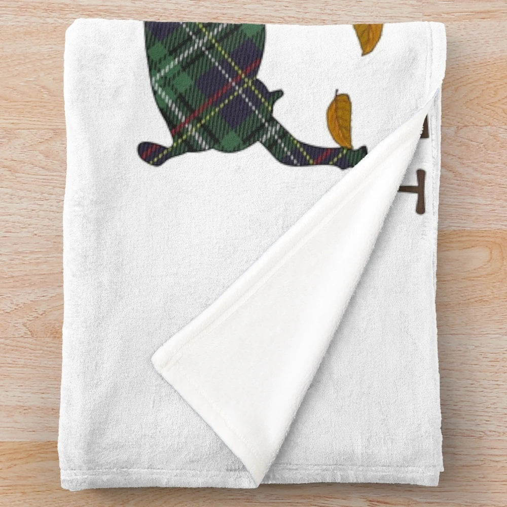 Plush blanket featuring a goat design and autumn leaves and acorns