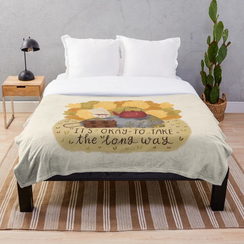Cozy plush blanket with autumn leaves and nature-inspired design