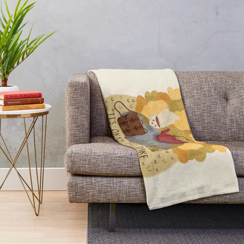 Cozy plush blanket with autumn leaves and nature-inspired design