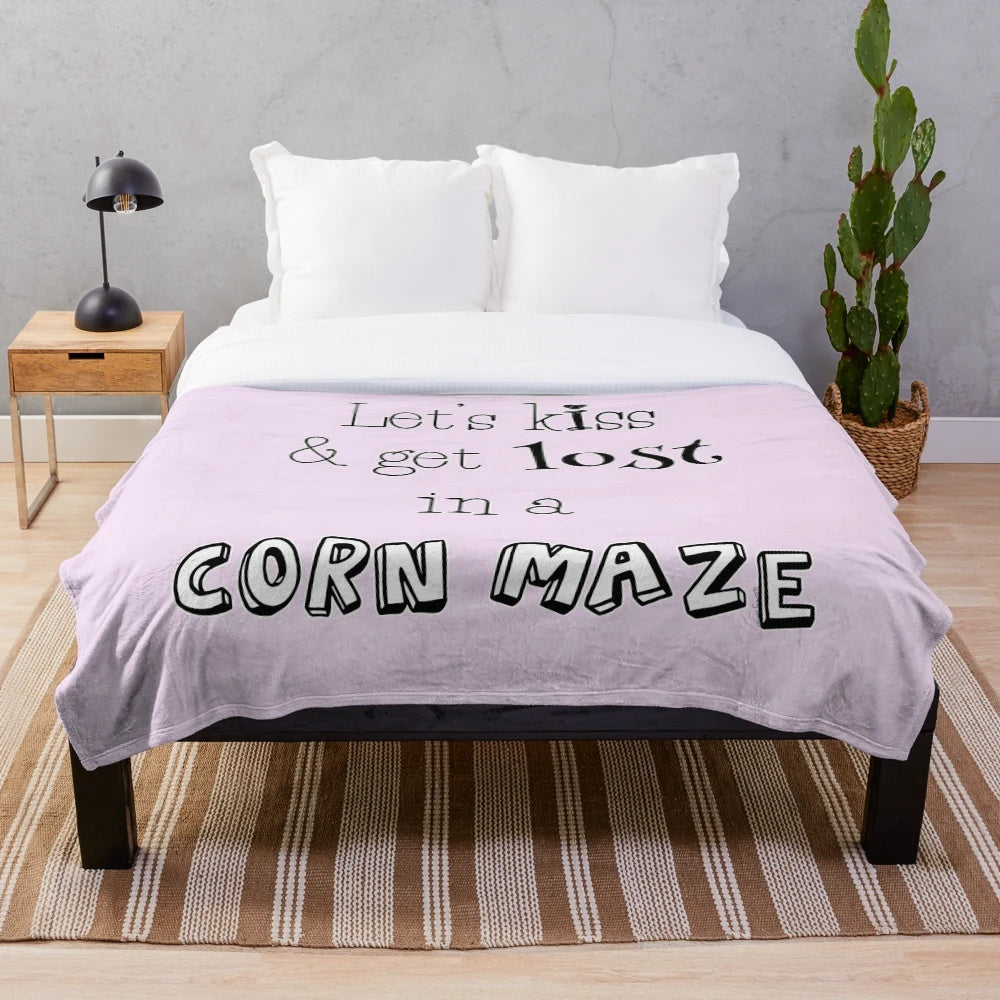 Plush blanket with fall-themed design