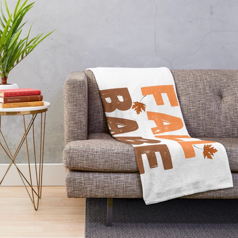 Autumn-themed plush blanket with leaf pattern