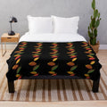 Cozy plush blanket featuring autumn leaves design