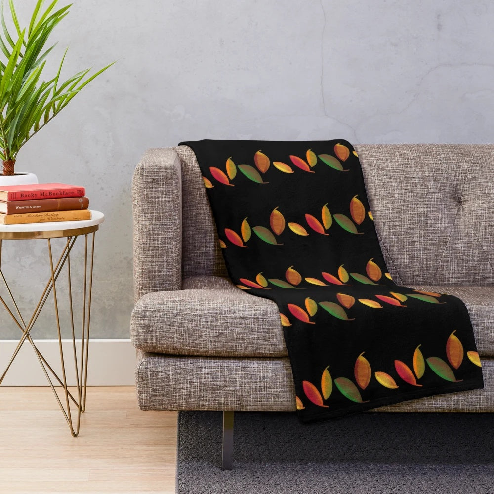 Cozy plush blanket featuring autumn leaves design