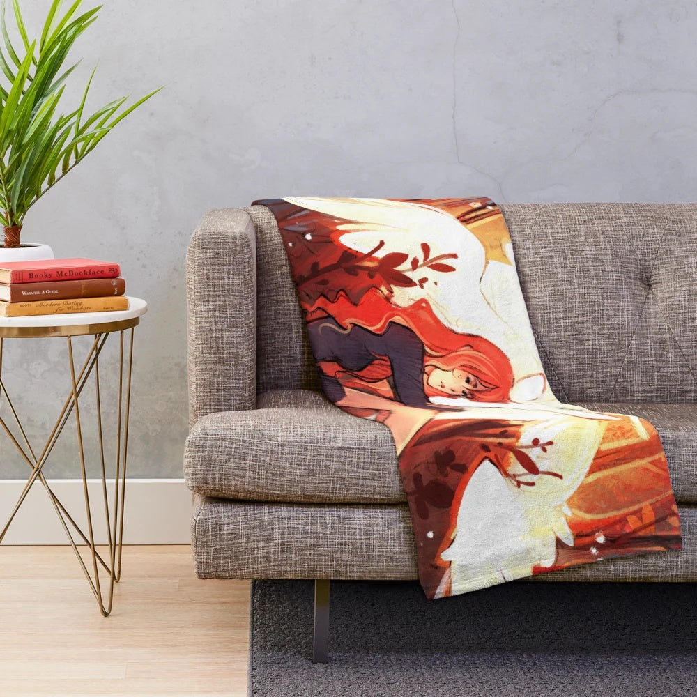 Plush blanket featuring a deer illustration in autumnal colors
