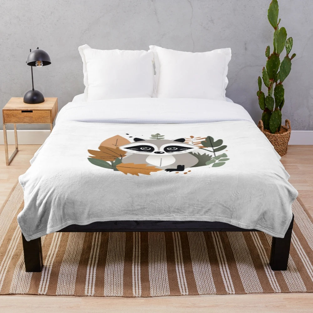 Plush blanket featuring a cute raccoon (trash panda) and autumn nature elements