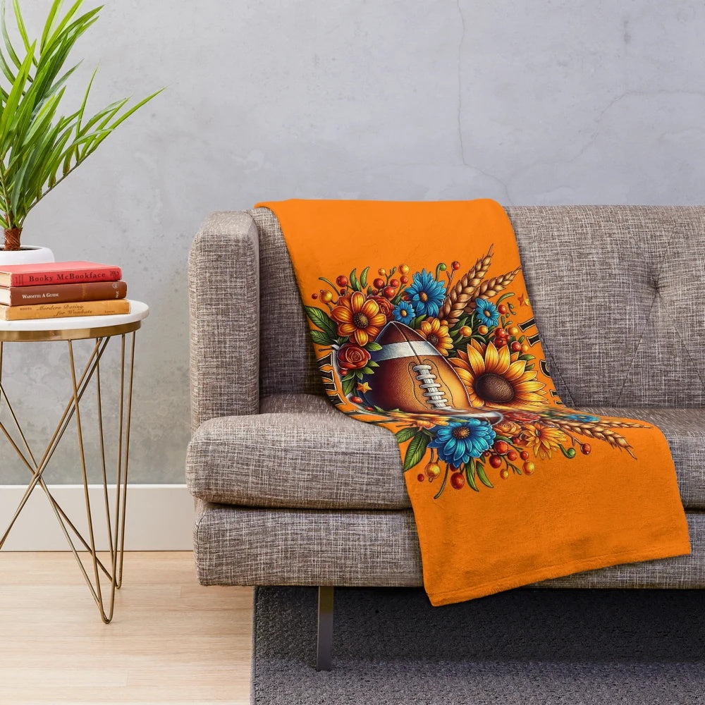 Plush autumn blanket with sunflowers and football patterns
