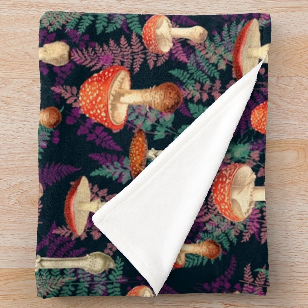 Cozy autumn plush blanket with mushroom and fern designs