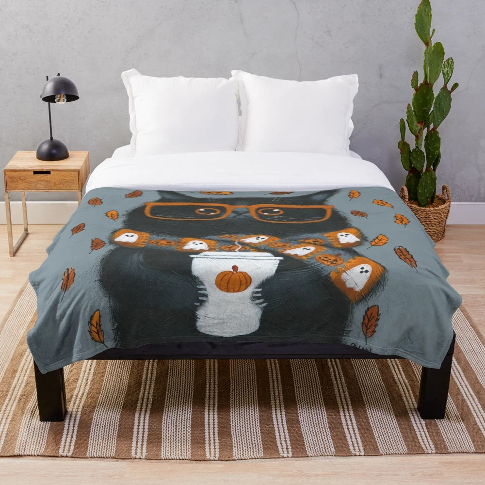 Cozy autumn plush blanket with pumpkin spice kitty design