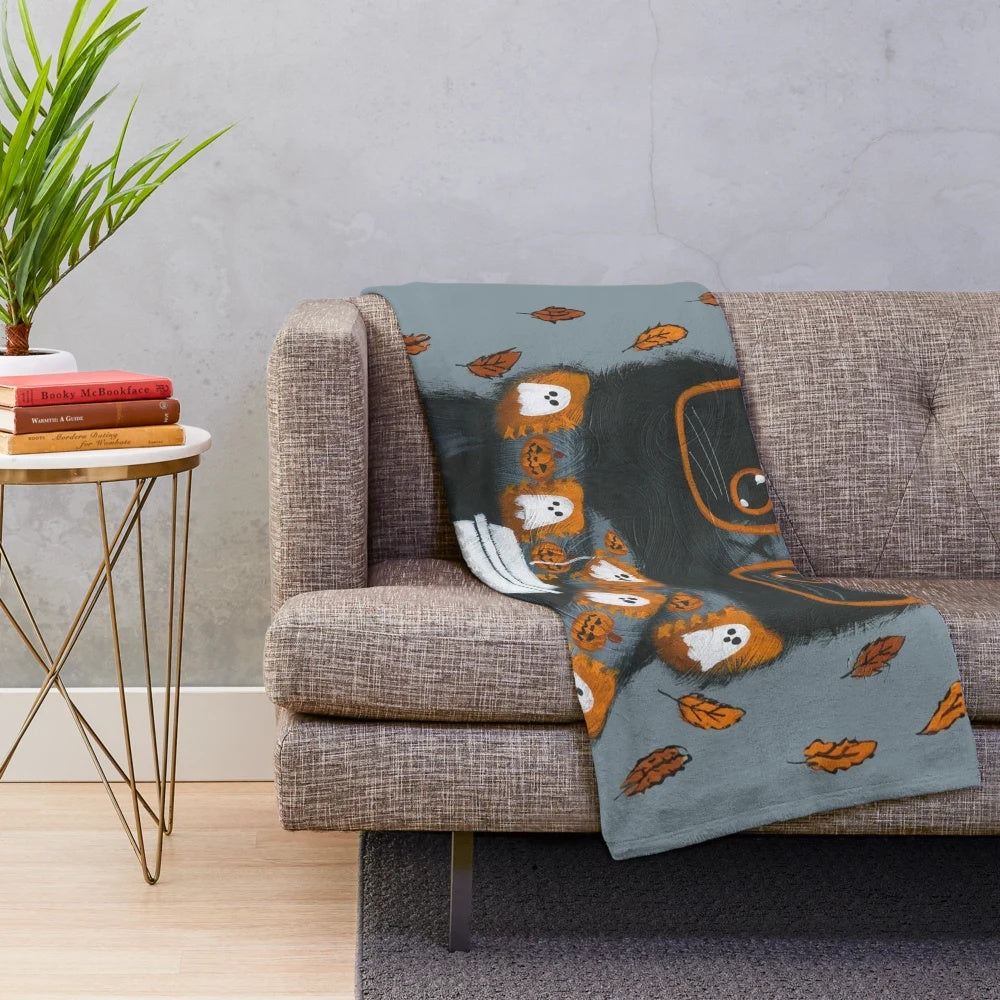 Cozy autumn plush blanket with pumpkin spice kitty design