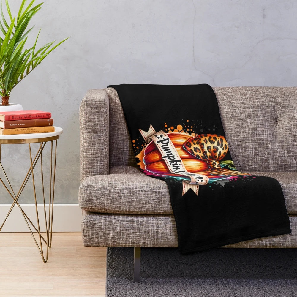 Cozy pumpkin-themed plush blanket with retro autumn design