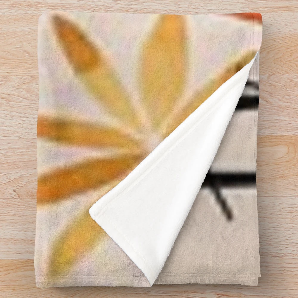 Plush blanket with fall-themed "Thankful and Blessed" print