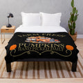 Plush blanket with watercolor pumpkin design