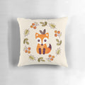 A decorative pillow featuring a cute red fox surrounded by autumn berries and foliage on a neutral background.