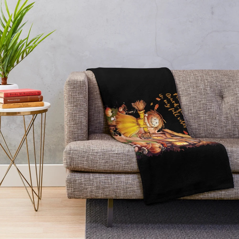 Plush fall blanket with scarecrow and cottage design