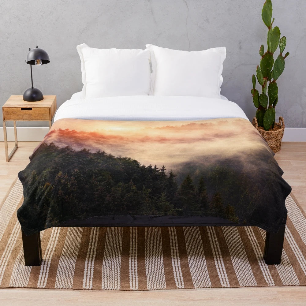 Plush blanket featuring an autumn sunrise landscape with a misty forest