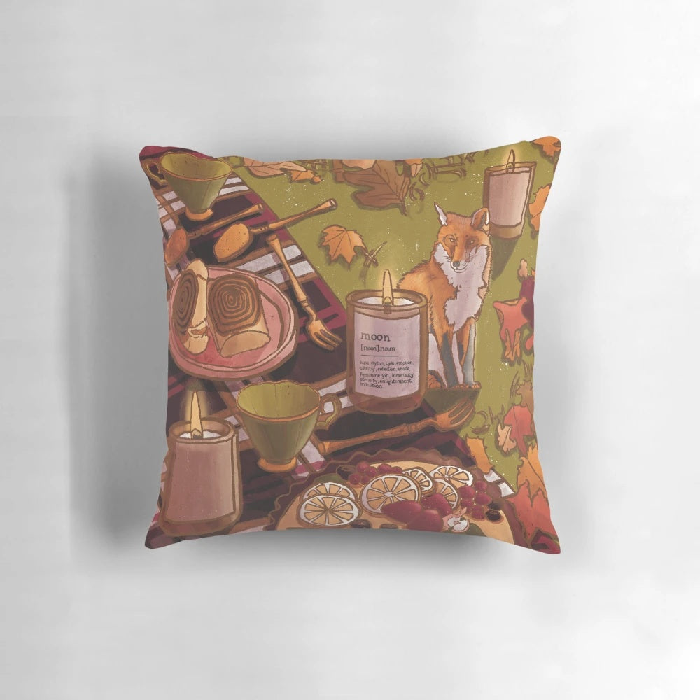 A cozy autumn-themed pillow with a whimsical fox and tea time motif, perfect for seasonal home decor.