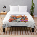 Plush autumn-themed blanket with urban fall artwork