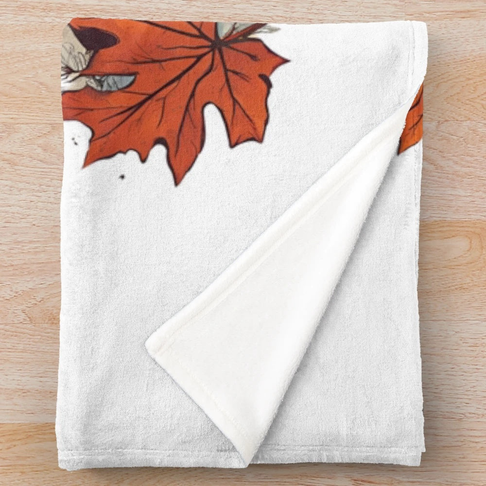 Plush autumn-themed blanket with urban fall artwork