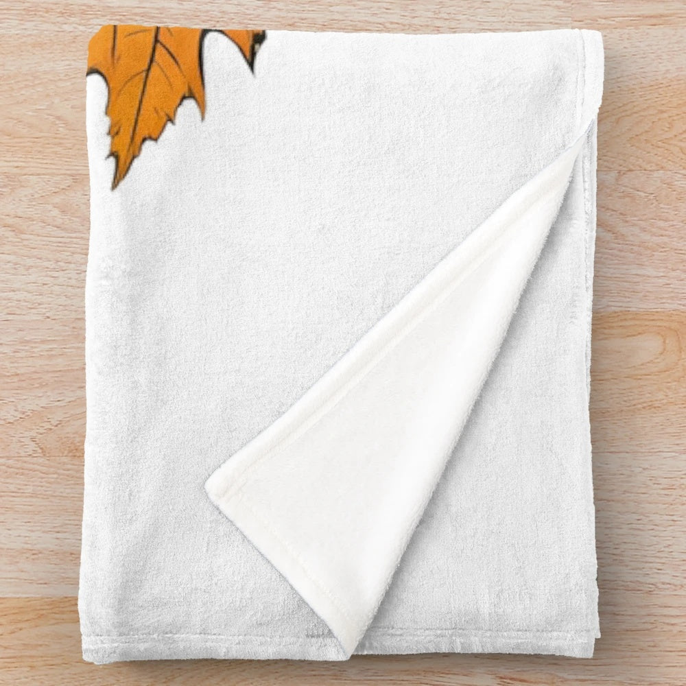 Plush blanket with autumn leaves and vibrant fall colors in an urban street art style