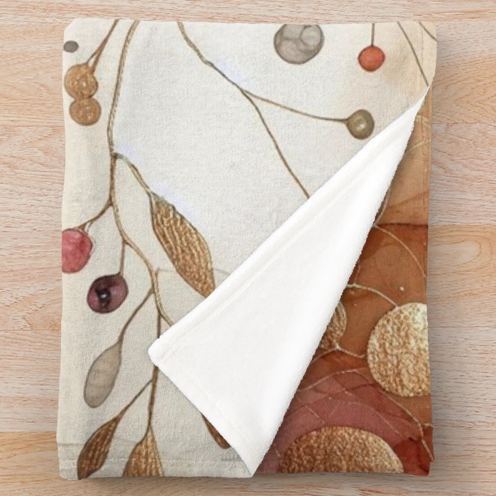 Cozy plush blanket with a watercolor abstract art design featuring autumn hues and nature elements