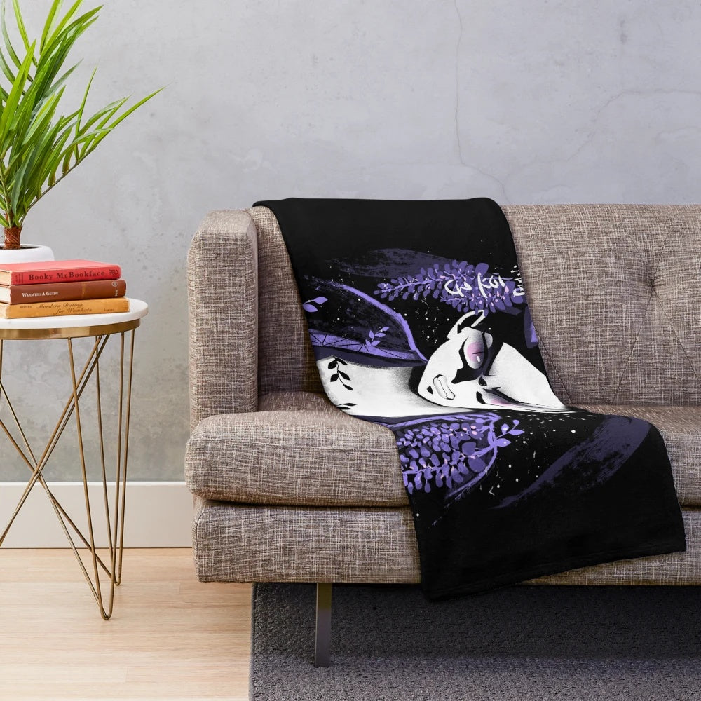 An artistic plush blanket featuring the awakened Nezuko Kamado from the anime series.